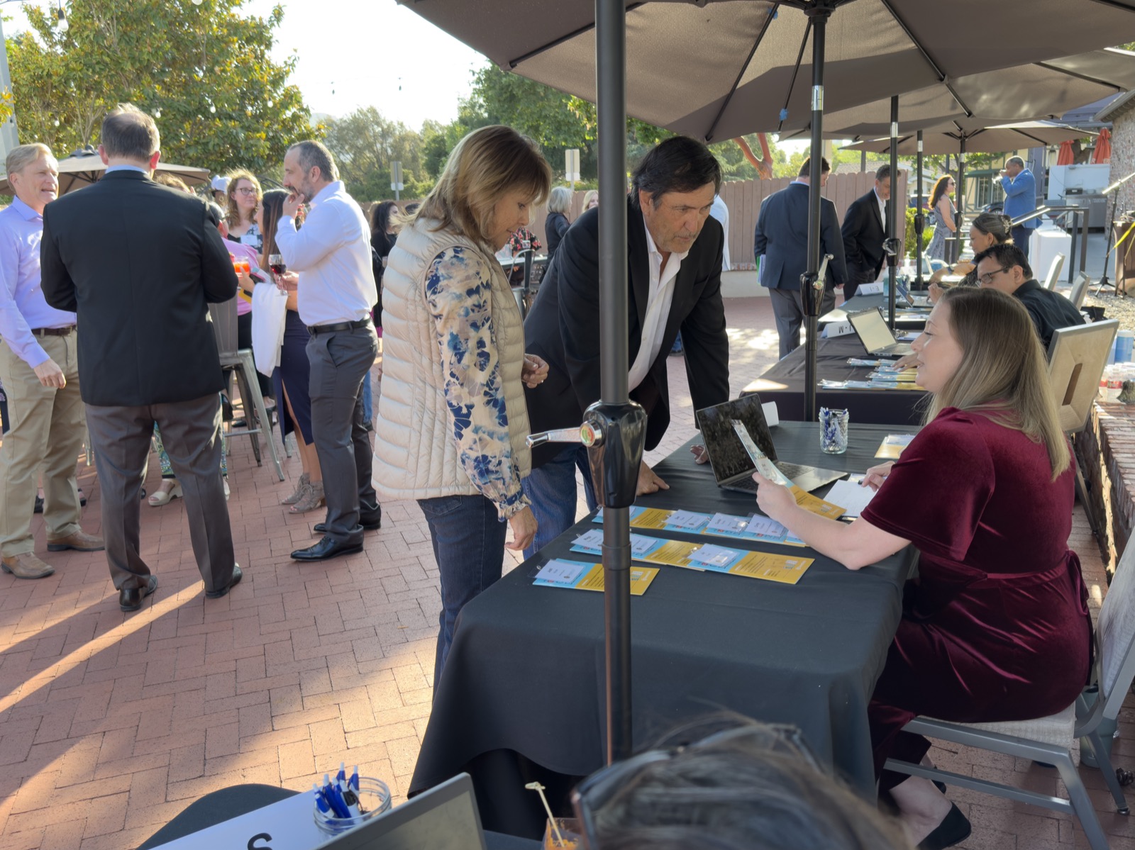 Check-in tables in the golden-hour light